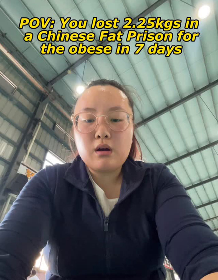 Young woman in a gym setting sharing experience of weight loss in a Chinese fat prison for the obese.