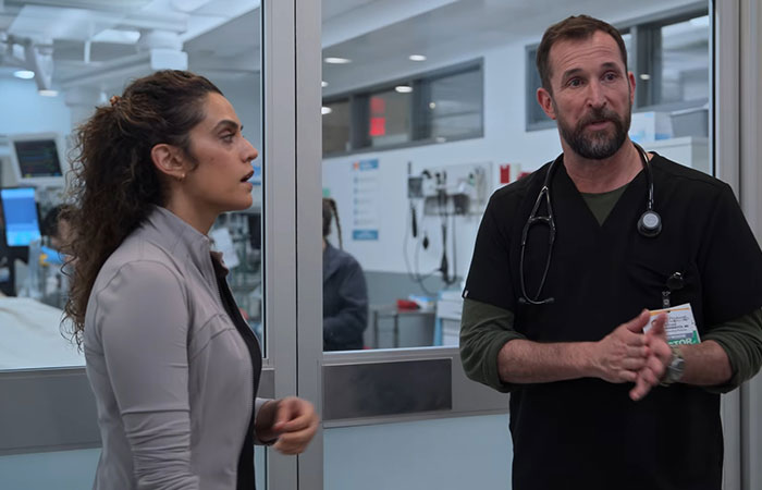 Two characters discussing a hospital scene related to the meaning of 2901 in The Pitt Season 2 Episode 2 ending.