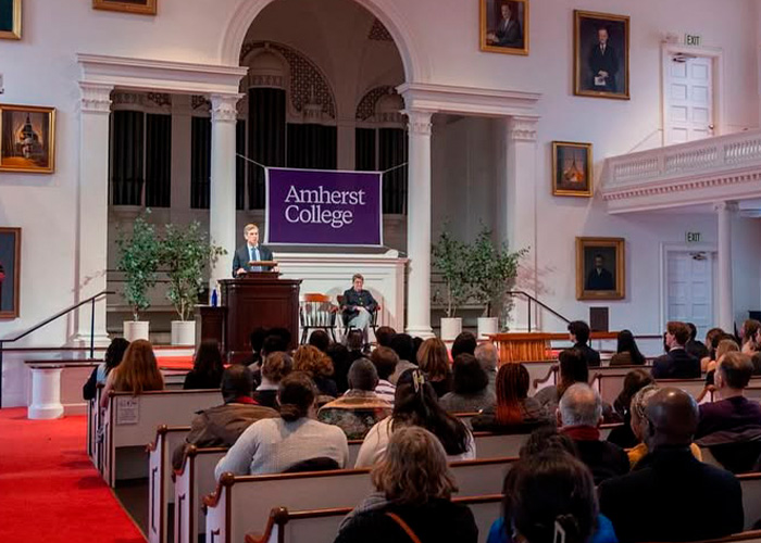 Audience listening to a speaker at Amherst College during an event linked to the recent firing spree controversy. Audience listening to a speaker at Amherst College during an event linked to the recent firing spree controversy.