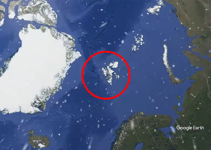 Satellite view of the world&rsquo;s darkest island in the Arctic region, highlighting its remote location and surrounding waters.