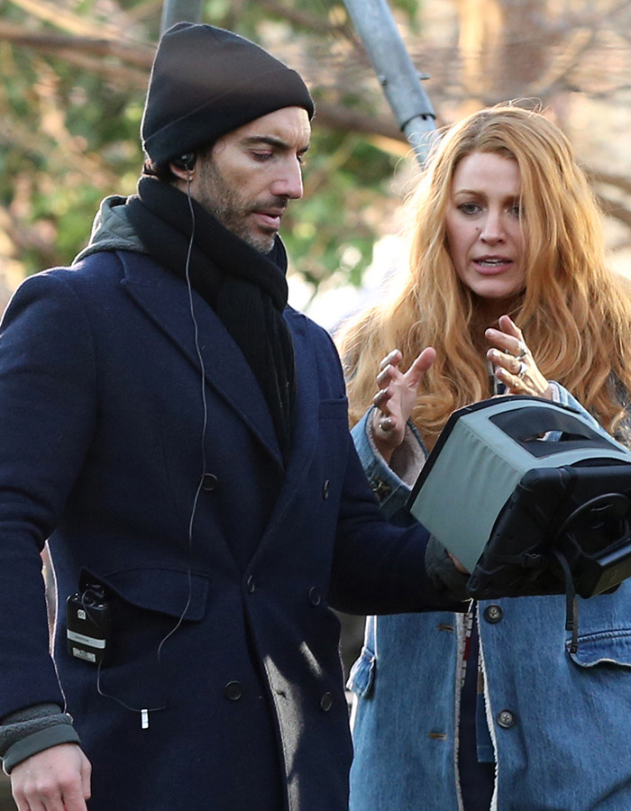 British actress Jameela Jamil in a winter coat and Blake Lively in denim jacket discussing on set outdoors.