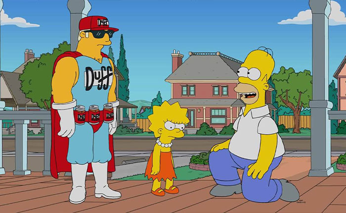The Simpsons 2026 predictions: Homer kneeling and laughing beside Lisa and a caped Duff Man on a suburban porch.