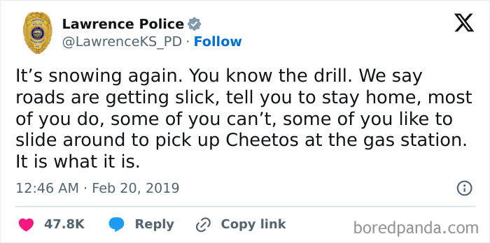 Tweet from Lawrence Police social media account humorously warning about slick roads during snow, showcasing unserious police social media accounts.