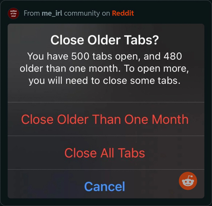 Browser alert showing 500 open tabs with option to close older tabs, related to New Year's resolutions for people who hate them.