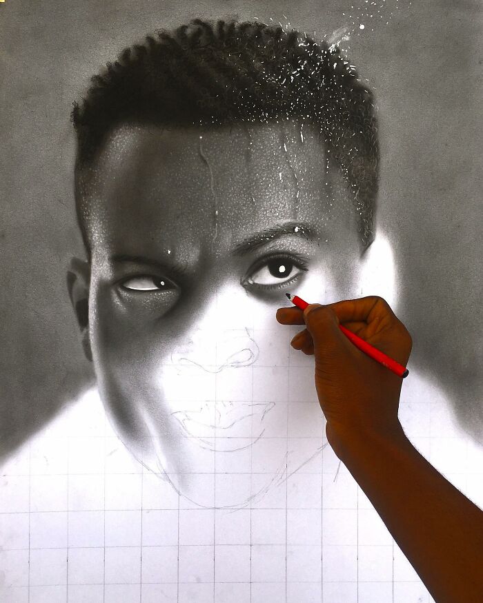 Artist drawing a hyperrealistic portrait of a man’s face with detailed eyes and textured hair in a behind-the-scenes process.