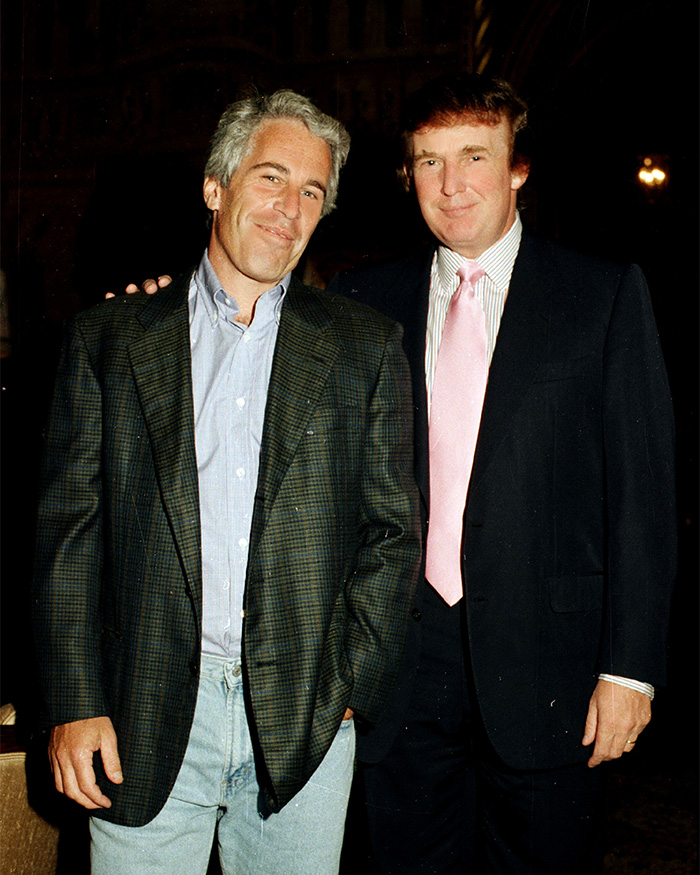 Jeffrey Epstein and Donald Trump posing together at a formal event, wearing jackets and smiling for the camera.
