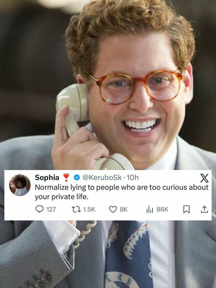 Man with curly hair and glasses smiling while holding a phone, with a funny social media screenshot on privacy.