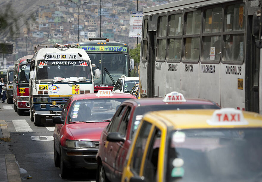 Heavy traffic congestion with taxis, buses, and cars in one of the cities with the worst traffic in the world.
