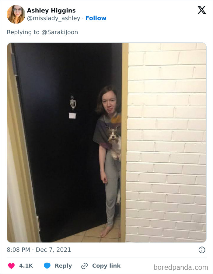 Delivery confirmation pic showing a woman peeking from a door with a dog, part of hilarious driver photos sent to customers.