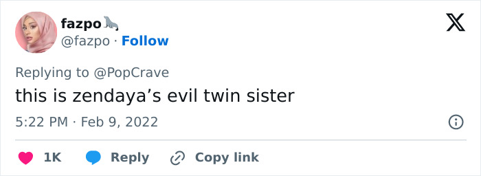 Tweet screenshot criticizing a wax figure at Madame Tussauds, user calls it an evil twin sister
