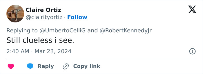 Tweet by Claire Ortiz replying about Alicia Silverstone glitching at Golden Globes, mentioning viral moment and past controversies.