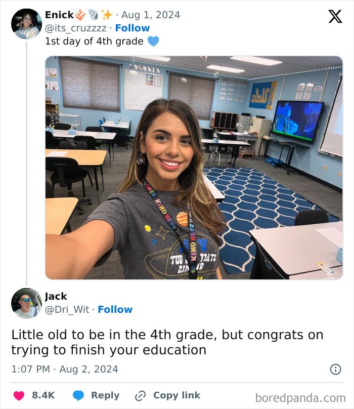 Young woman smiling in a colorful classroom, capturing a funny screenshot to distract from responsibilities.