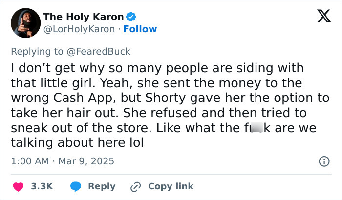 Tweet discussing a Maryland hairstylist dragging a teen client by her hair in a viral salon video.