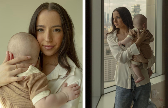 Ashley St holding a baby Romulus Musk indoors by a window, representing Elon Musk&rsquo;s children and complex family relationships over two decades.