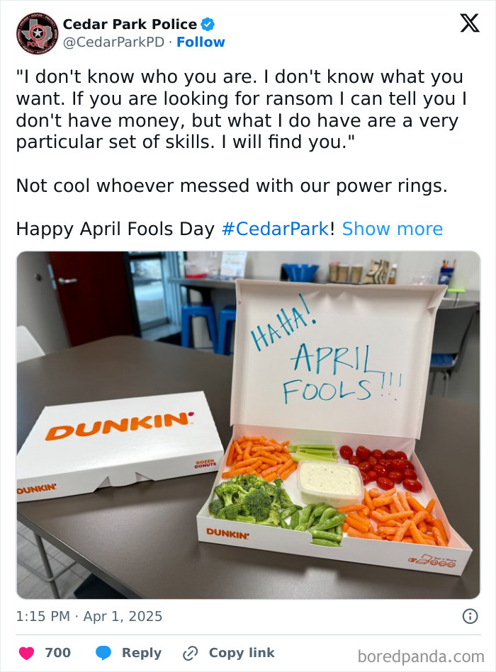 Police social media post showing a prank vegetable platter in a Dunkin' box, highlighting unserious police accounts humor.