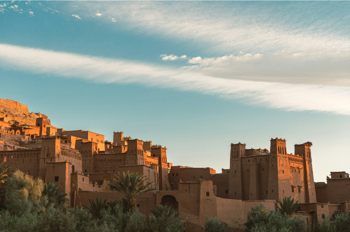 Ancient fortress in one of the oldest countries in the world, surrounded by greenery under a clear sky.