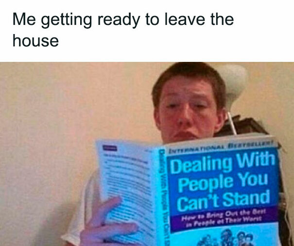 Person reading a humorous book about dealing with people, illustrating relatable memes that hit way too close to home.
