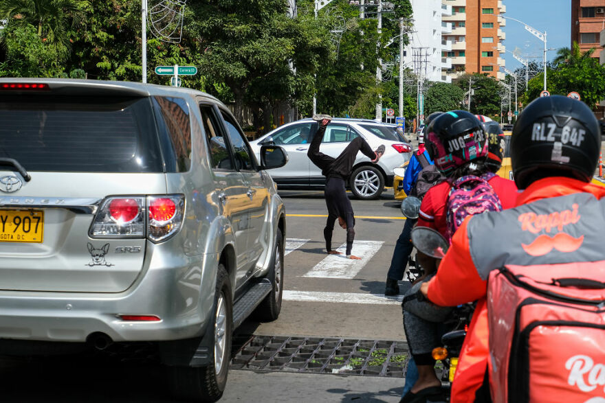 Traffic congestion with cars and motorbikes on a city street, illustrating cities with the worst traffic in the world.