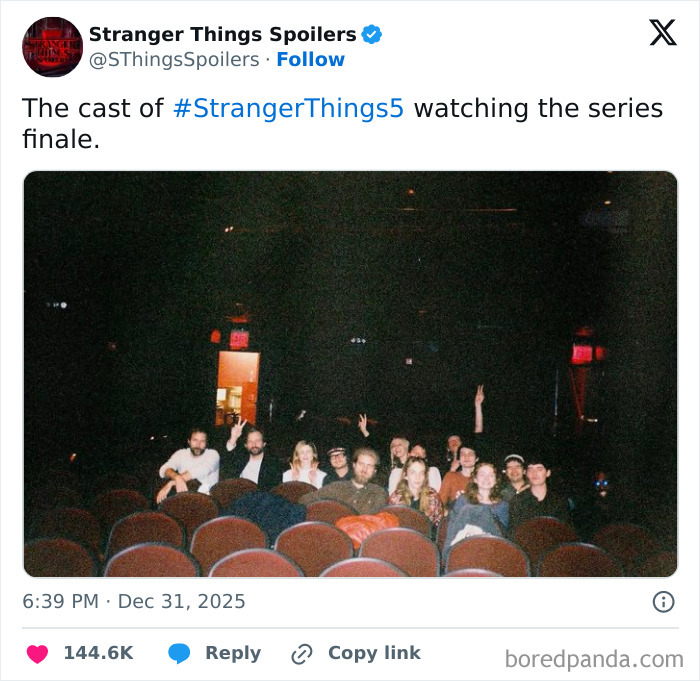 Cast of Stranger Things 5 sitting in theater seats watching the series finale, reacting to the show's ending.
