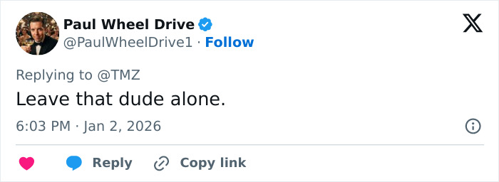 Screenshot of a tweet replying to TMZ with the message Leave that dude alone, posted by Paul Wheel Drive.