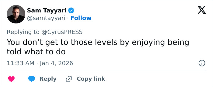 Miley Cyrus pushes back at photographers during a tense red carpet encounter, asserting she is a woman not a dog.