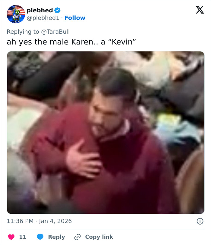 Male Karen in red sweater clutching chest and arguing amid crowded Broadway audience during Mamma Mia! performance