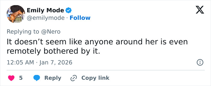 Screenshot of tweet expressing concern over Ariana Grande Wicked set photo saying no one around her seems bothered