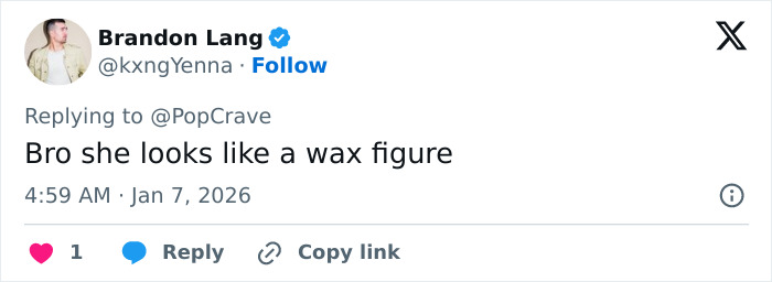 Screenshot of a tweet criticizing Ariana Grande saying she looks like a wax figure, reply icon and timestamp visible