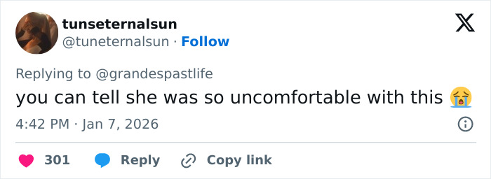 Tweet text expressing fan reaction about Ariana Grande and Madonna's resurfaced performance being uncomfortable, sparking backlash.