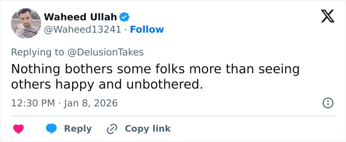 Screenshot of a tweet about a woman facing vicious trolling after going viral for breast reduction in 2026.