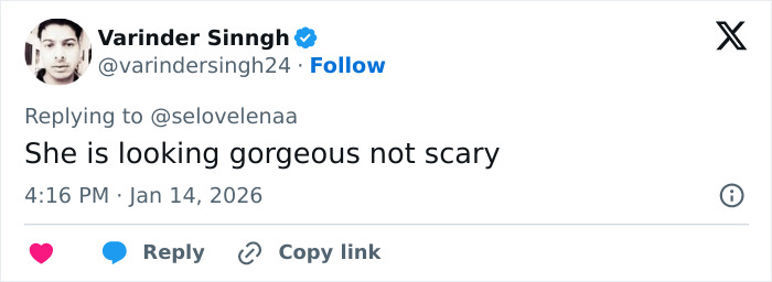 Screenshot of a social media reply discussing Kylie Jenner&rsquo;s Golden Globes seat photo sparking online debate.