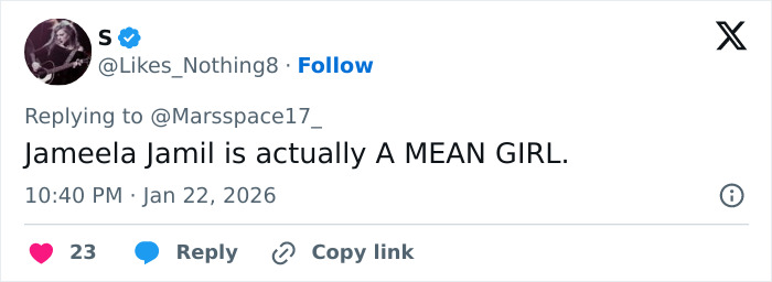 Tweet showing user calling British actress Jameela Jamil a mean girl in a reply on social media platform.