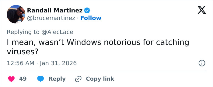 Tweet by Randall Martinez replying to AlecLace, commenting humorously about Windows catching viruses on social media.