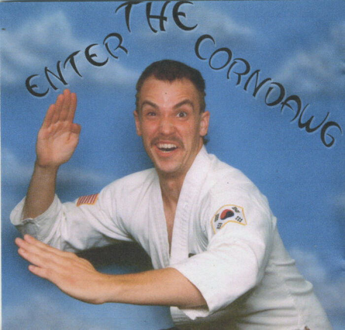 Man in a martial arts outfit posing awkwardly with exaggerated expression on a hilariously bad album cover design.