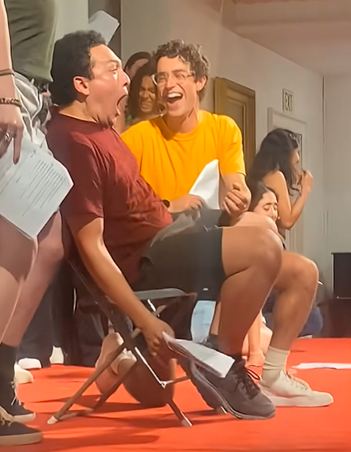 Group of students in casual clothing laughing and reacting dramatically during Amherst College raunchy orientation ceremony event. Group of students in casual clothing laughing and reacting dramatically during Amherst College raunchy orientation ceremony event.