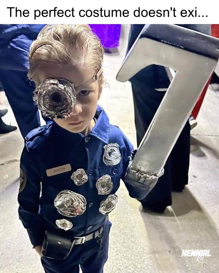 Child in creative police costume with bullet hole effects holding large number seven, nostalgic trip down memory lane.
