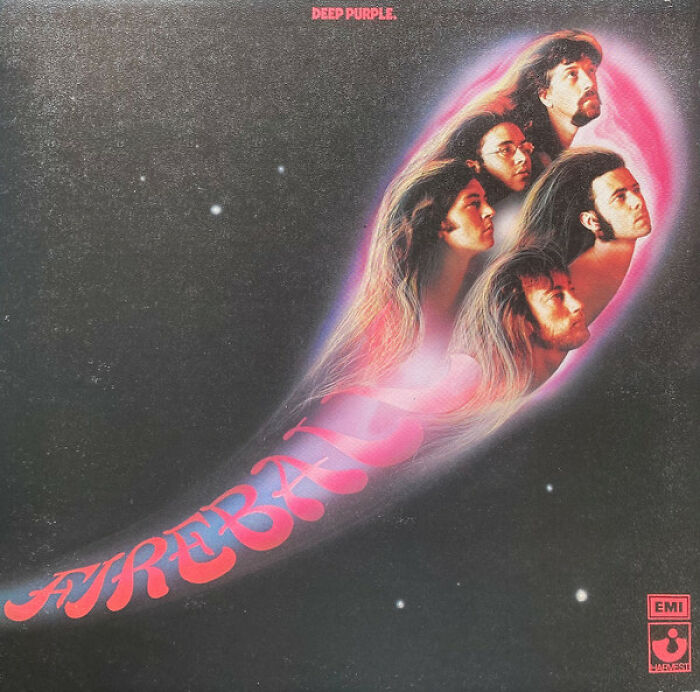 Deep Purple Fireball album cover featuring floating band members' heads in a fiery comet trail against a dark space background.