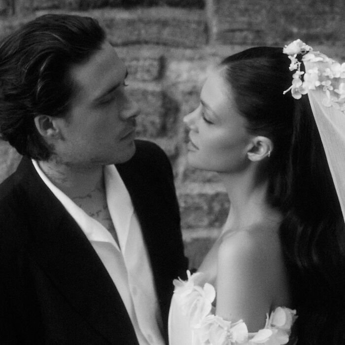 Cruz Beckham mocking Brooklyn's claim about Victoria dancing inappropriately at his wedding in a black and white photo.