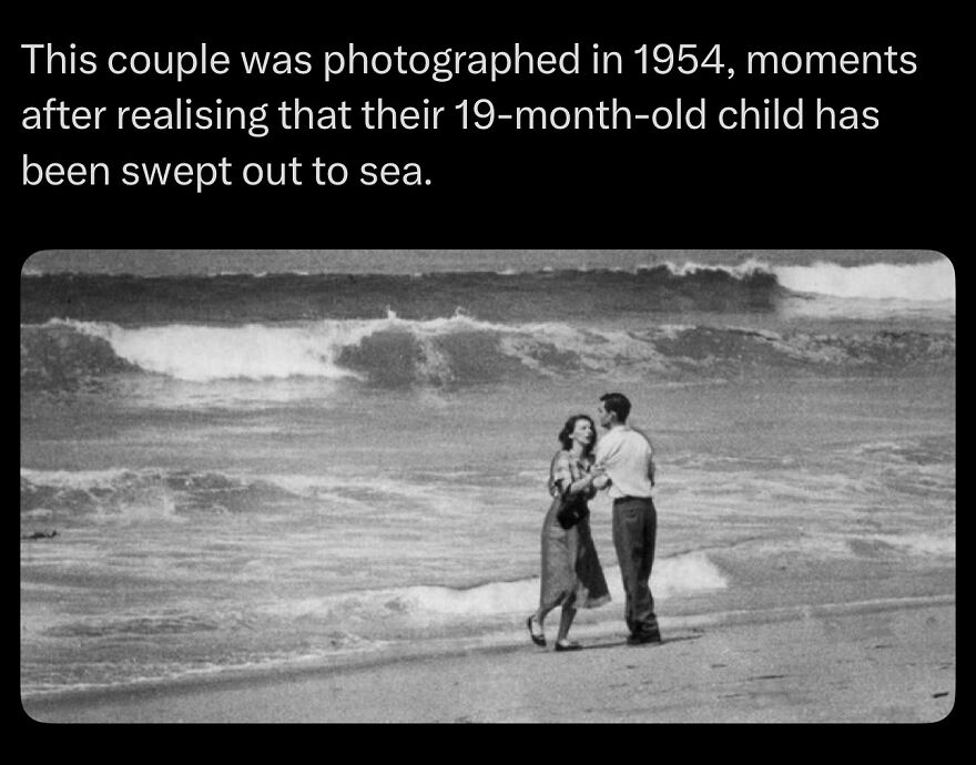 Black and white photo of a distressed couple on the beach, evoking eerie and scary bones facts emotions.