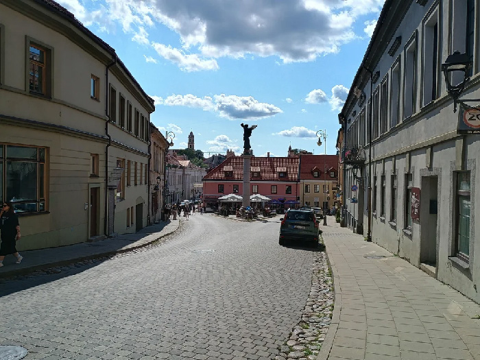 Cobblestone street in a European town representing best countries to raise a family with safe and welcoming environment.
