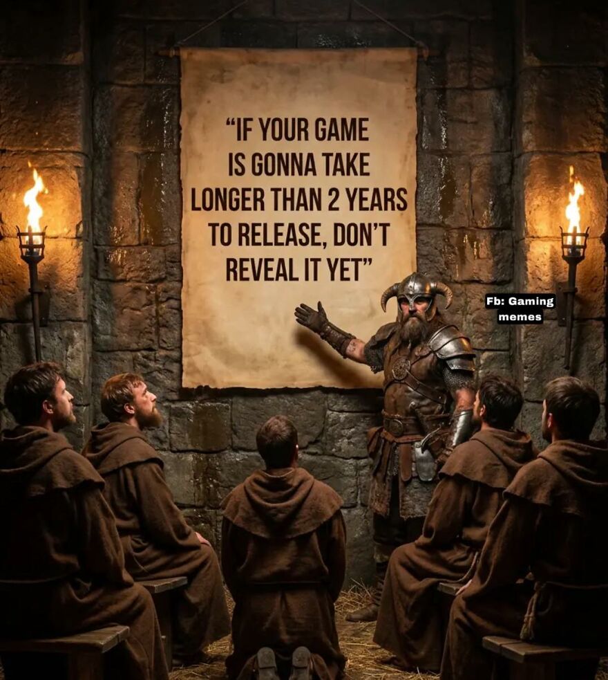 Medieval warrior presenting a gaming meme about video game release delays to monks in a dimly lit stone room.