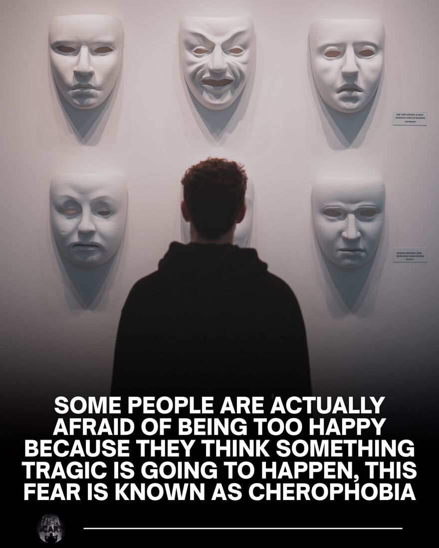 Person facing a wall with six white emotion masks, illustrating fear and psychological themes related to scary facts and bones.