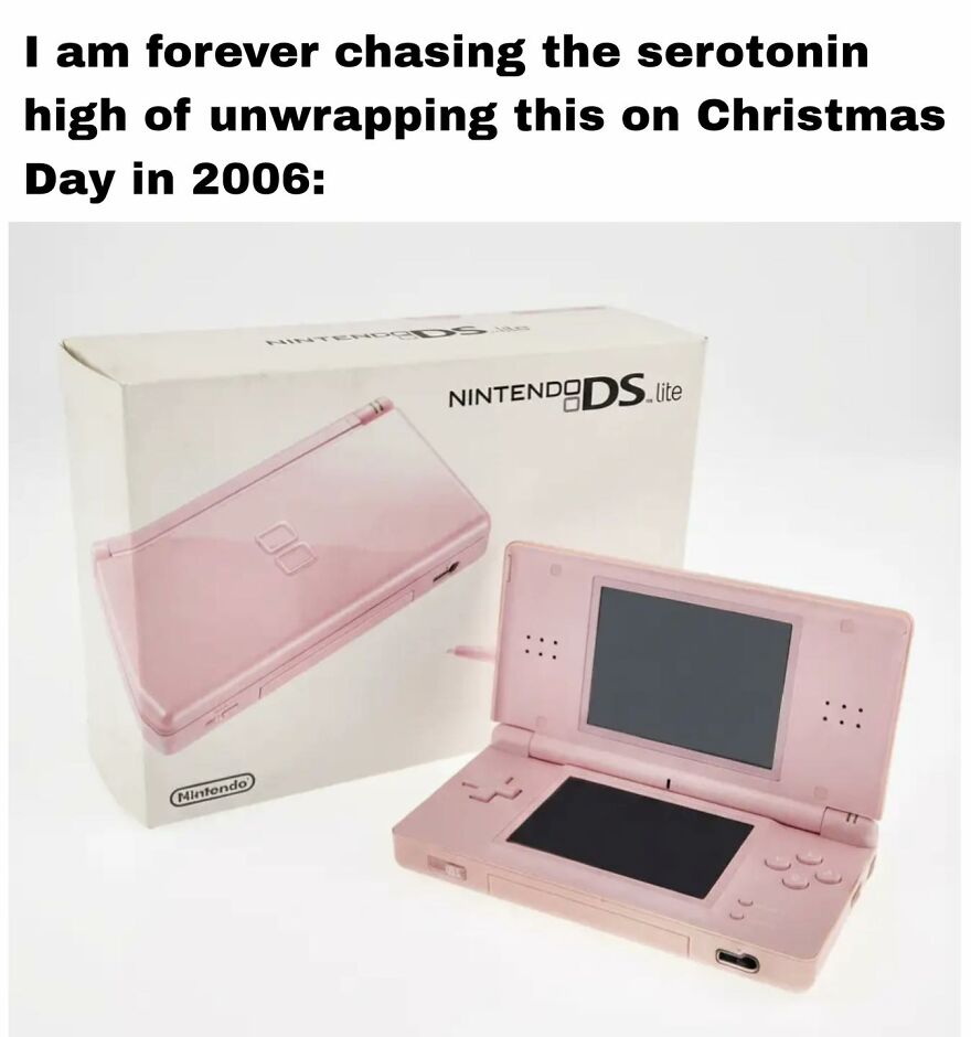 Pink Nintendo DS Lite handheld console with box, representing nostalgic video games for exhausted adults wanting to play.