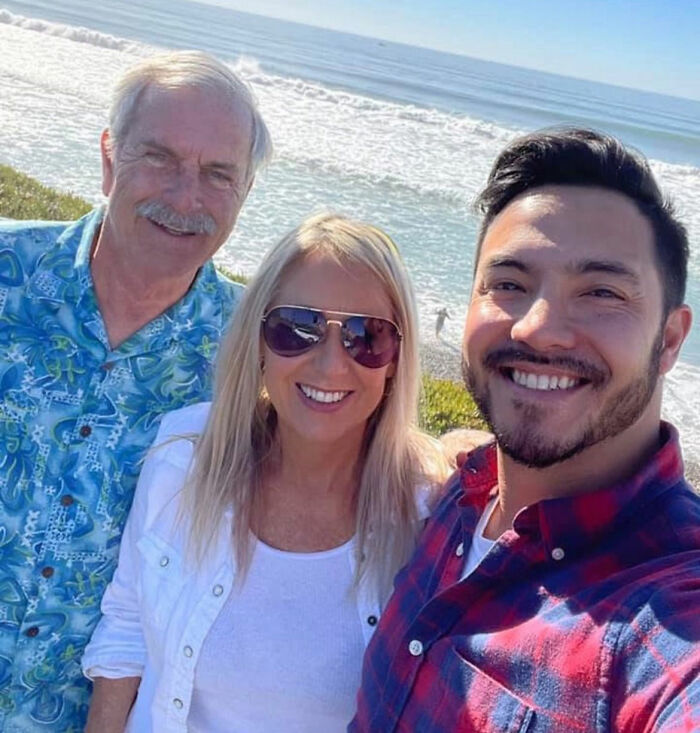 Three people smiling by the ocean, representing a marine veteran&rsquo;s heartbreaking final text after a tragic Marketplace meetup.