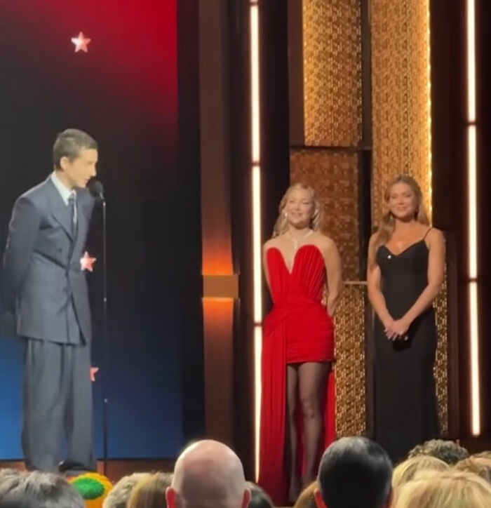 Timothée Chalamet speaking on stage at event with two women, fans point out sad detail about Kylie Jenner mention. Timothée Chalamet speaking on stage at event with two women, fans point out sad detail about Kylie Jenner mention.