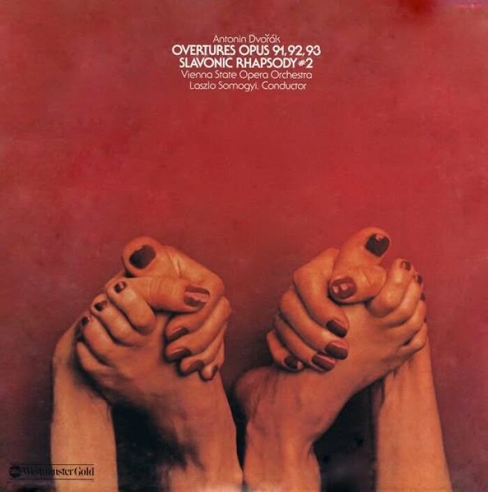 Abstract album cover showing hands holding feet with painted nails on a red background, part of hilariously bad album covers.