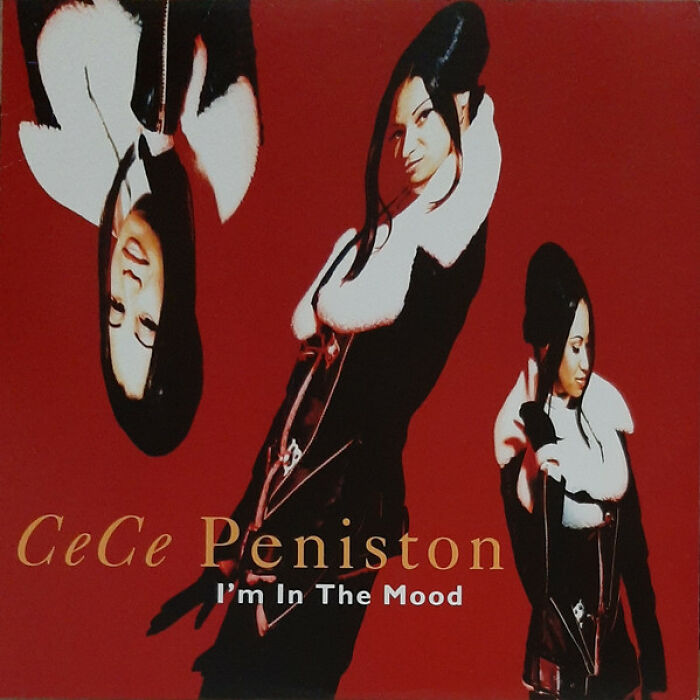 CeCe Peniston posing in a red and black outfit on a hilariously bad album cover design.