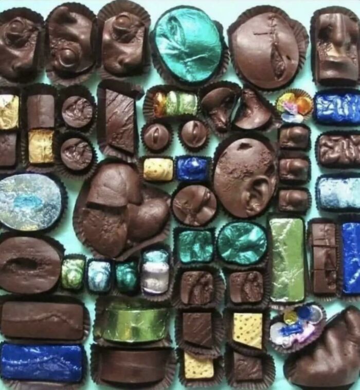 Assortment of creepy chocolates with unusual shapes and colors, evoking both fascination and unease.
