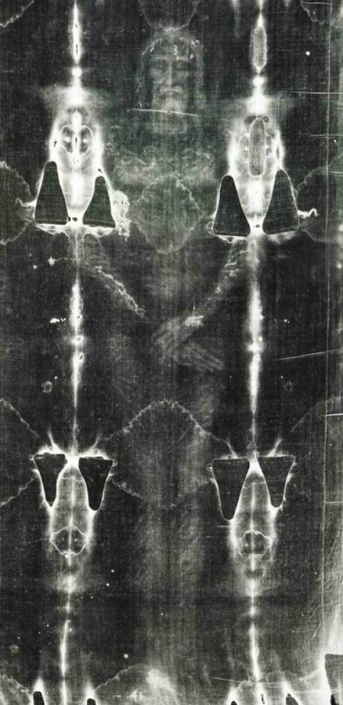 Fascinating but creepy photo of the Shroud of Turin showing a ghostly human figure imprint on cloth.