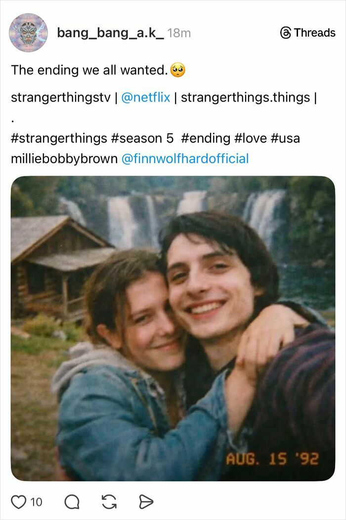 Fans react to the Stranger Things season 5 ending with a smiling couple hugging near a waterfall and cabin.